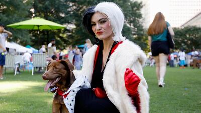 Atlanta-area resident Megan Nelson poses for a photo with her dog Darla. The pair won the costume contest award for best dog and owner combination.