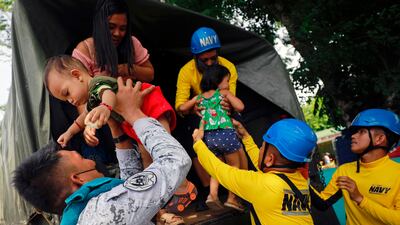 A mass evacuation at a school in Santo Domingo, Philippines on Tuesday after lava started to flow towards villages from the Mayon volcano. EPA
