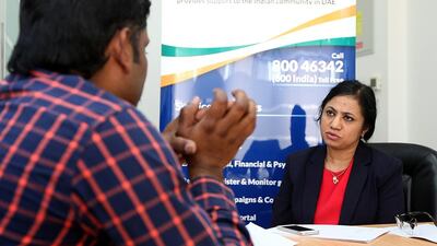Lawyer Bindu Chettur, right, gives counsel at the Indian Workers’ Resource Centre, which helps Indian workers in Dubai with a variety of problems. Satish Kumar / The National