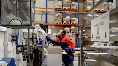 A worker prepares vaccines for shipment at the Movianto distribution centre in Oss, in the Netherlands. EPA
