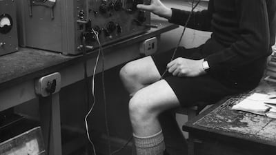 Michael Lucas, a pupil at Gordonstoun, tunes a piece of equipment used for electronics training at the end of term in 1961