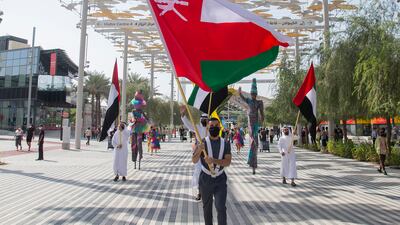 People take part in the Oman National Day parade, on Expo 2020 Dubai's Horizon Avenue. Photo: Expo 2020 Dubai