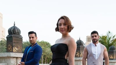 Vincenzo Visciglia, left, and Ahmad Ammar, co-founders of Dubai fashion brand Aavva, with Anna Vladi, creative director of Rira Gallery, at the Fashion Forward event at Madinat Jumeria on April 12, 2014. Duncan Chard for the National.