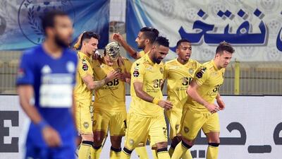 Al Wasl, in yellow, won their second straight Arabian Gulf League match against Bur Dubai rivals Al Nasr at the Zabeel Stadium on Friday night. Courtesy Pro League Committee