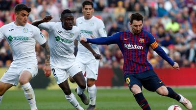 Lionel Messi takes a shot at goal. AP Photo