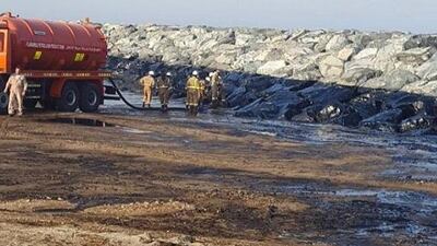 The oil slick washed ashore on to the beach at Kalba on Sharjah’s east coast on Sunday. Courtesy Environment and Protected Areas Authority in Sharjah