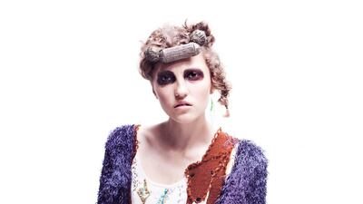 Jacket, Dh5,388, Craig Lawrence. Dress, Dh6,313, Tsumori Chisato. Head prop, price on request, Tomihiro Kono