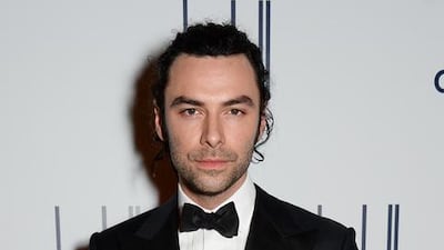 Aidan Turner wore an Alfred Dunhill bespoke dinner jacket and white formal shirt with a white pocket square. Courtesy dunhill