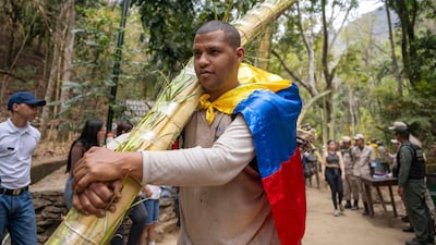 Palm frond pickers arrive in the Waraira Repano National Park on the eve of Palm Sunday in Caracas. AFP