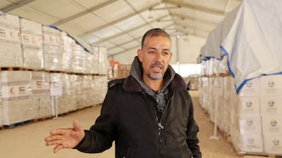 Mahmoud Ahmed works at the UAE aid warehouse in Al Arish, Egypt. Pawan Singh / The National