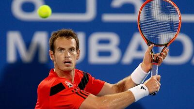 Andy Murray endured a rough return to the court after his back surgery in a straight-sets loss to Jo-Wilfried Tsonga at the Mubadala World Tennis Championship on Thursday. Sammy Dallal / The National