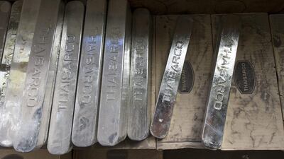 Ingots of tin imported from Thailand at the Nousaka metal crafts factory in Takaoka ready for melting. Everett Kennedy Brown / EPA