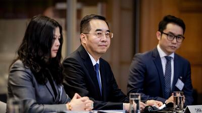Ma Xinmin, centre, of China's Ministry of Foreign Affairs, at the International Court of Justice in The Hague on February 22. AFP