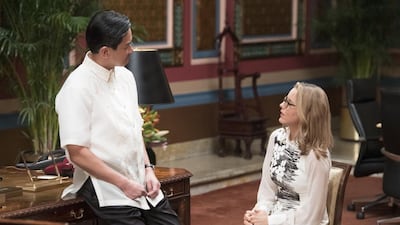 A still from the Madam Secretary episode Break in Diplomacy - starring Joel de la Fuente as Filipino president Datu Andrada and Tea Leoni as Elizabeth McCord, the US secretary of state. David M Russell / CBS / Getty Images