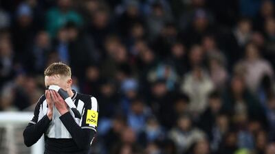 Newcastle United's Sean Longstaff looks disappointed. AFP