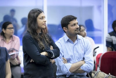 Proud parents Afsheen and Arsalan Sheikh watch on as son Asad and daughter Zara get in full voice for the pioneering choir. Reem Mohammed / The National