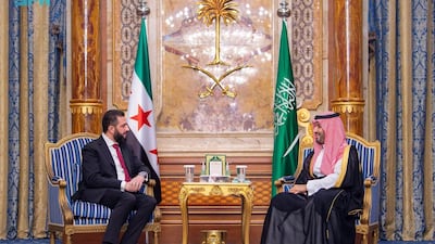 Ahmad Al Shara, left, with Crown Prince Mohammed bin Salman in Jeddah. Photo: SPA