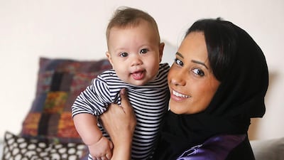 Khawla Saleh, with seven-month-old son Adam, said the course allowed her to better appreciate her children’s development and equipped her with an insight into ‘fatherly fathering’ to share and a better grasp of emotional intelligence. Delores Johnson / The National