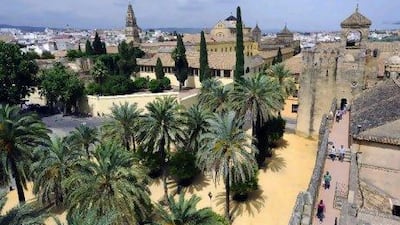 A view of Cordoba from the Alcazar de los Reyes Cristianos, or Palace of the Christian Kings, with the Mezquita's belfry in the background.