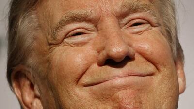 Republican presidential candidate Donald Trump smiles after speaking at the Iowa Renewable Fuels Summit in Iowa. Patrick Semansky / AP