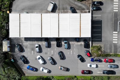 Drivers queueing for fuel at a branch of retail warehouse Costco in Liverpool, north-west England. AFP