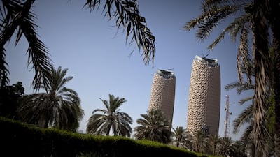 The twin 29-storey Al Bahr Towers use a solar shading system that features a computer-controlled facade made up of thousands of translucent units. Razgova / The National
