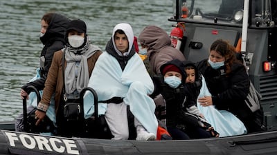 Young migrants sail into Dover on May 23, 2022. PA