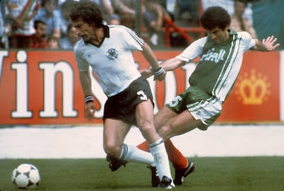 West Germany's Paul Breitner vies for the ball with Algerian midfiedler Mustapha Dahleb in Gijon. AFP