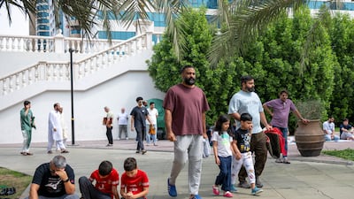 Worshippers gather for Friday prayers at Al Qasba mosque in Sharjah. Ahmed Ramzan / The National