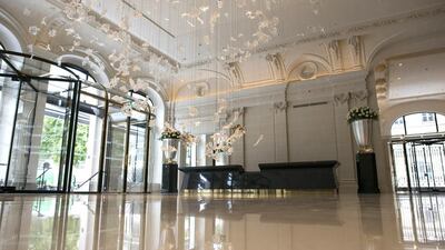 The old ballroom of the hotel, where the Vietnam peace talks took place from 1969-1973, has become a sweeping, light-filled breakfast room, tearoom and lobby, above. Fred Dufour / AFP