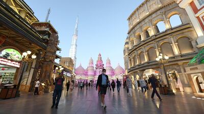 A man wearing protective mask, following an outbreak of coronavirus, walks at Global Village in Dubai The emirate has introduced measures to reduce the economic impact of the coronavirus pandemic. Reuters
