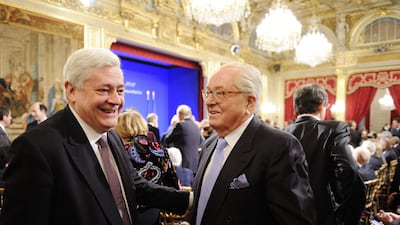 Jean Marie Le Pen, right, with party colleague Bruno Gollnisch at the Elysee Palace in Paris in 2012. EPA