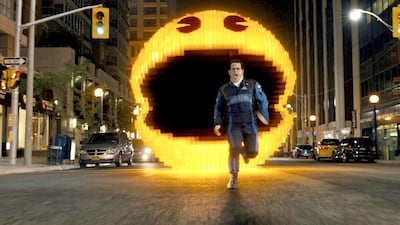 Josh Gad as Ludlow chased by Pac-Man in Pixels. Sony Pictures via AP
