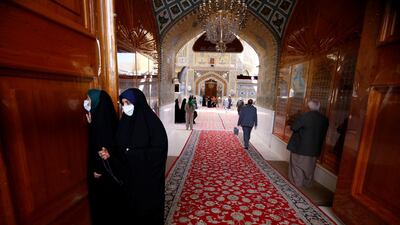 Female pilgrims wearing protective masks at Imam Ali Shrine in Najaf. Reuters