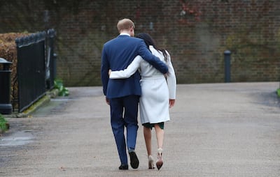 Meghan Markle wore a coat by Line, green dress by P.A.R.O.S.H and heels by Aquazzura. EPA
