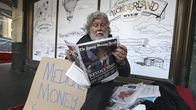 A man reads a newspaper showing president-elect Donald Trump, in Sydney. Australian prime minister Malcolm Turnbull says his country will work “as closely as ever” with the United States under Donald Trump’s new administration. Rick Rycroft / AP Photo