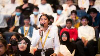 A pupil addresses the minister during a question-and-answer session
