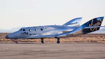Virgin Galactic's SpaceShipTwo, dubbed the VSS Unity, lands after completing its first ever free-flight test. Kenneth Brown / Reuters