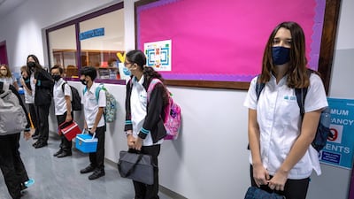 Children maintain social distancing at British International School Abu Dhabi.