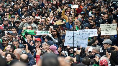 People gather for a mass anti-government demonstration in the centre of the Algerian capital Algiers. AFP