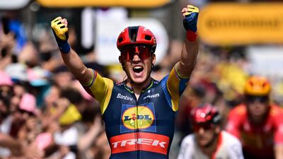 Lidl-Trek's Danish rider Mads Pedersen celebrates after winning the eighth stage of the Tour de France. AFP