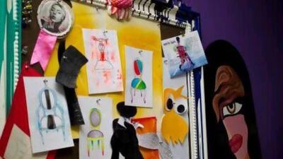 Above, as a pinboard in her Al Quoz studio reveals, she is inspired by all forms of popular culture, from TV shows and movies to fashion illustrations, blogs, magazines and gossip sites. Razan Alzayani / The National