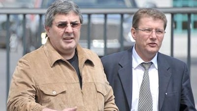 Chechen businessman and Neuchatel Xamax Football Club owner Bulat Chagaev, left, arrives with Club President Andrei Rudakov for the club's annual lunch. Chagaev bought the majority of the shares in the club in May 2011.