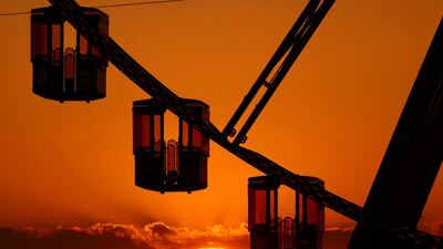 A Ferris wheel is seen during sunset in Brussels. Reuters
