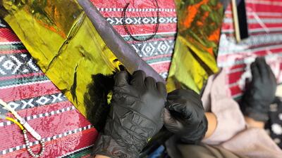 The goal is to make a burqa that is 1.25 meters long. The completed burqa will be presented at the Women's Pavilion at the Expo on December 2. The National