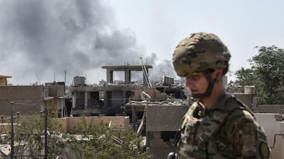 A US soldier is seen in the city of Mosul on June 21, 2017, during the offensive by Iraqi troops to retake the last district still held by ISIS. AFP