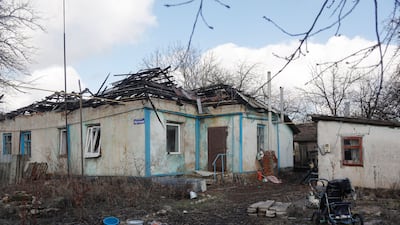 A damaged house in Vibrovka village. EPA