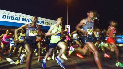 Runners take the start of the Dubai Marathon in the Gulf emirate. AFP Photo