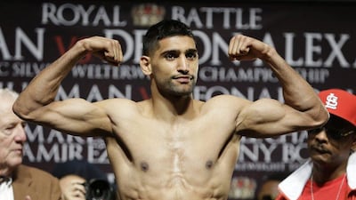 Amir Khan ran his professional record to 30-3 with a win over Devon Alexander on Saturday night. John Locher / AP / December 14, 2014