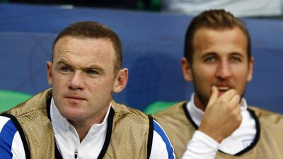 England forwards Wayne Rooney and Harry Kane on the bench. Jason Cairnduff / Reuters